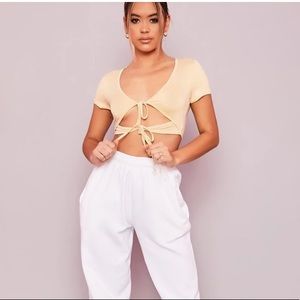 cropped tie front v-neck sectioned top blouse
